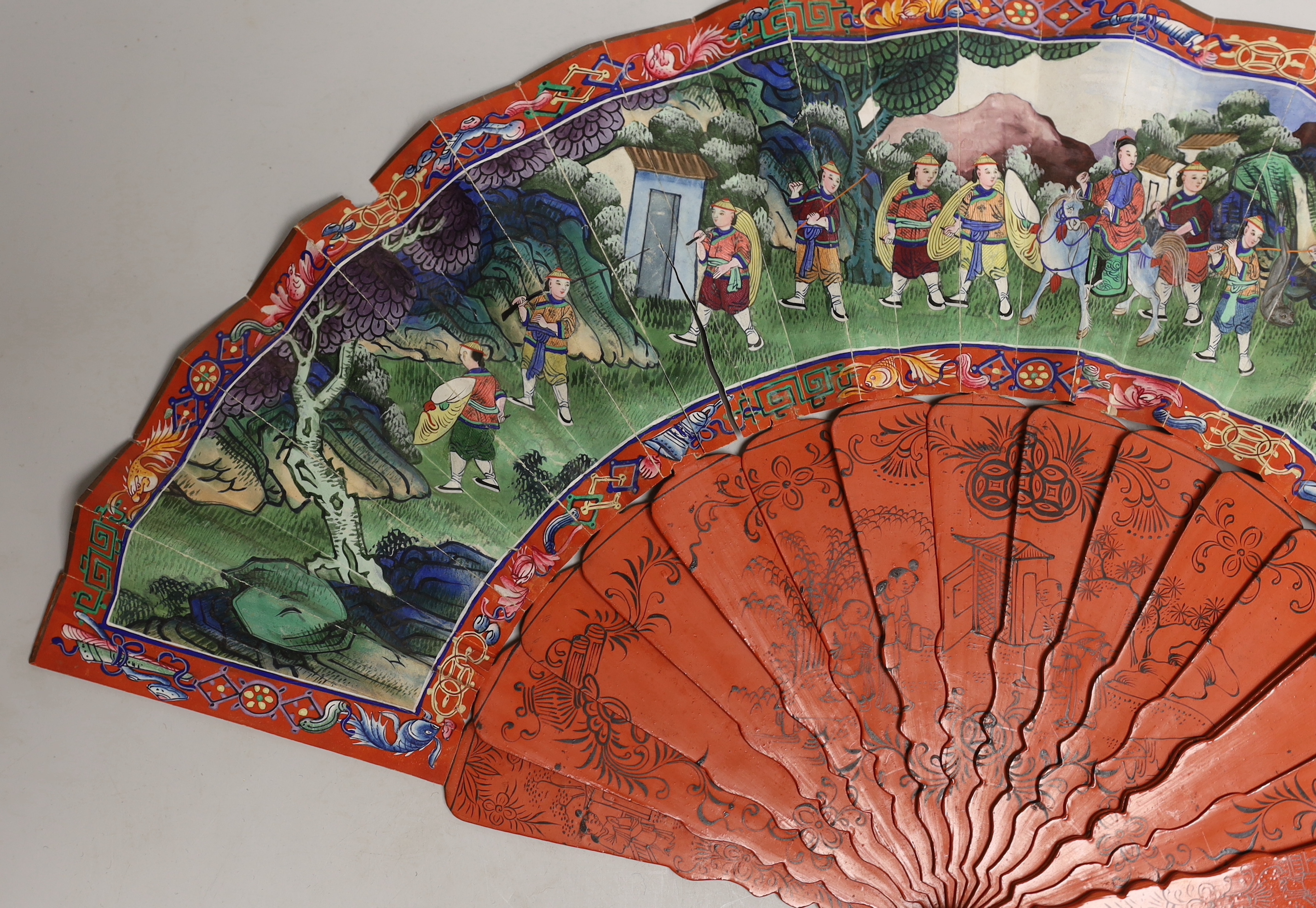 A Chinese hand painted figural fan with applied ivory faces and red lacquered guards, and boxed both damaged CITES Submission reference ERW33PQG